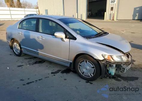 2010 Honda Civic Hybrid z USA, uszkodzony, nr VIN JHMFA3F23AS006199